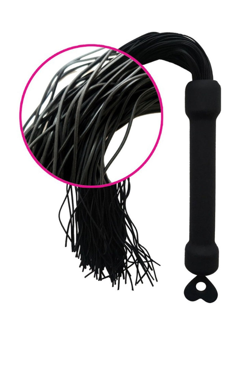 Black flogger with close-up of thongs on a white background