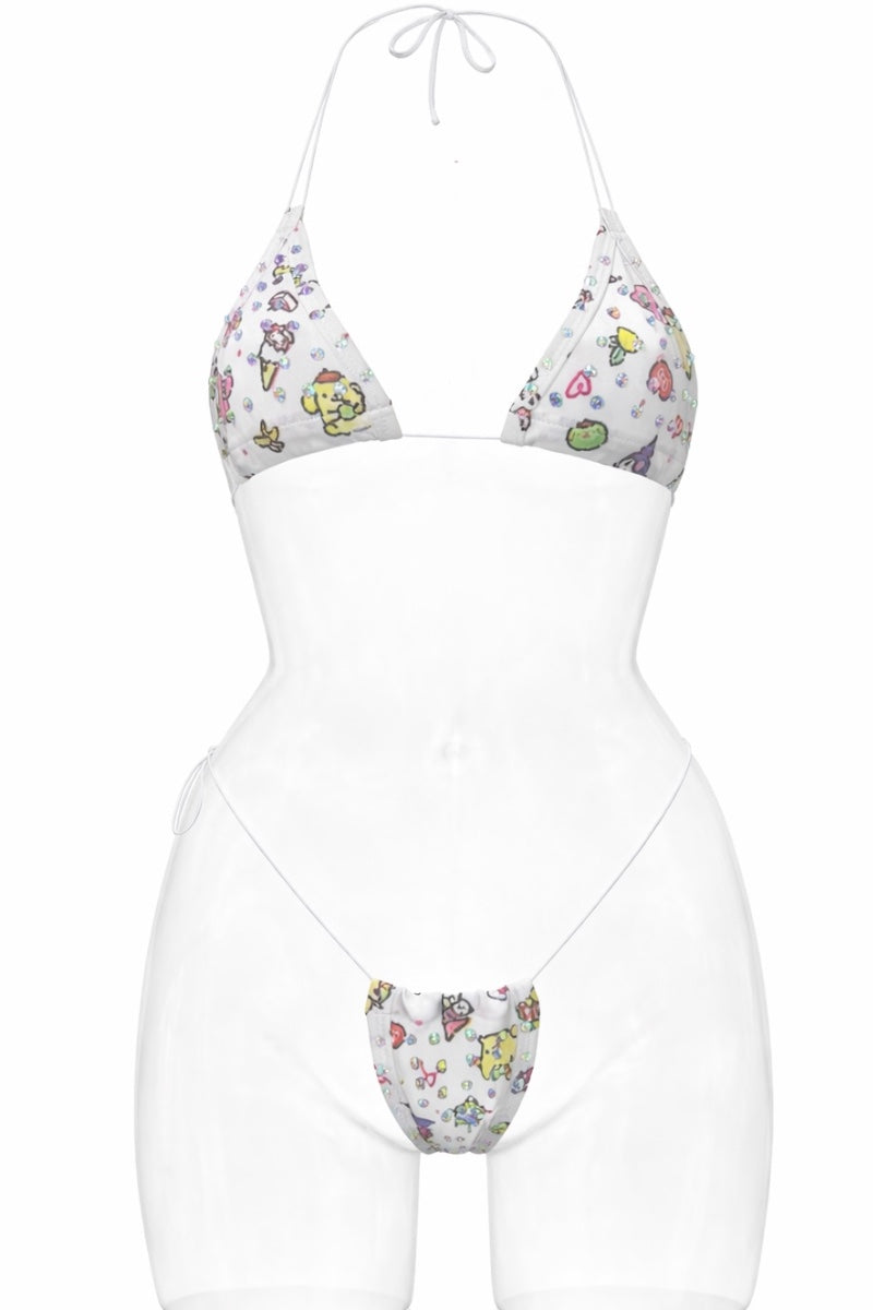 White bikini with colorful butterfly pattern on a white background