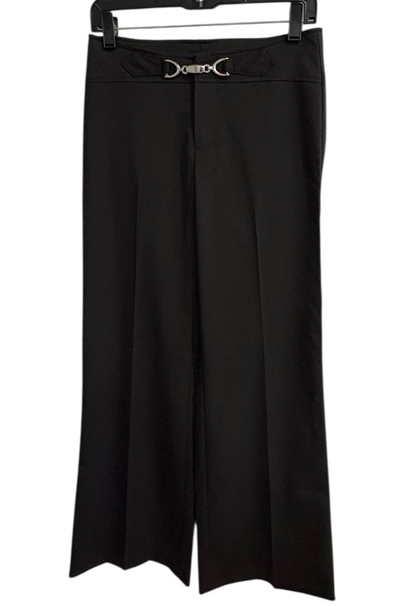 Black wide-leg pants on a hanger with a white background