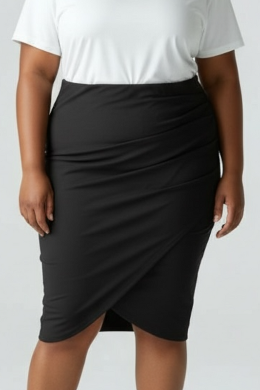 Person wearing a black skirt and white top on a plain background