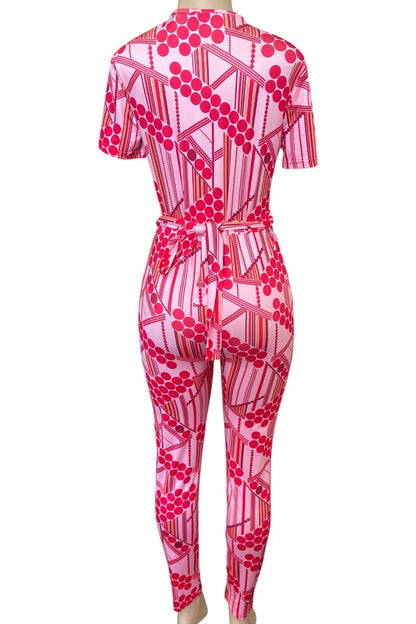 Pink patterned jumpsuit on a white background
