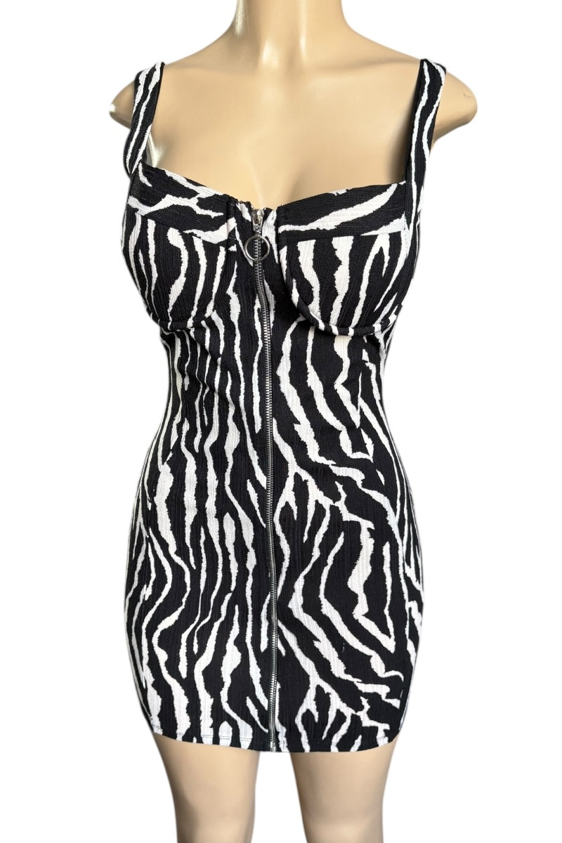 Black and white zebra print dress on a mannequin against a white background