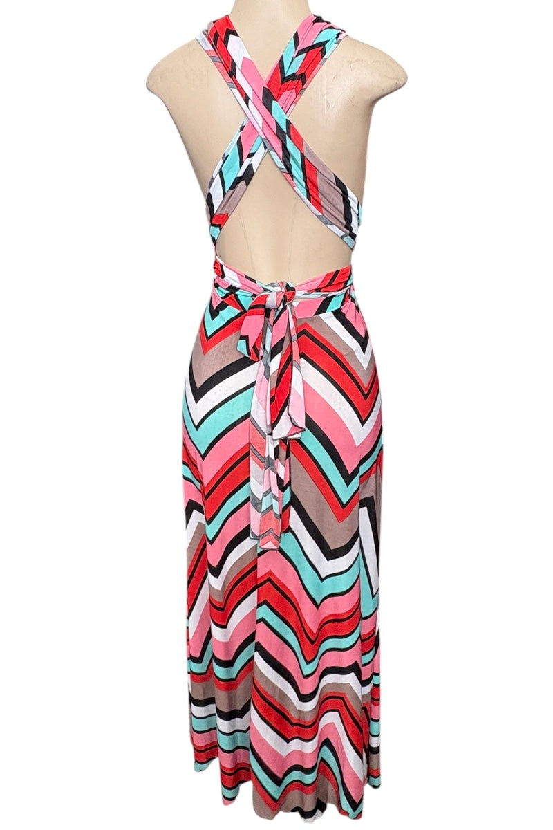 Colorful striped halter dress on a mannequin against a white background