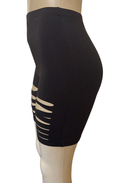 Black shorts with cut-out design on a mannequin against a white background