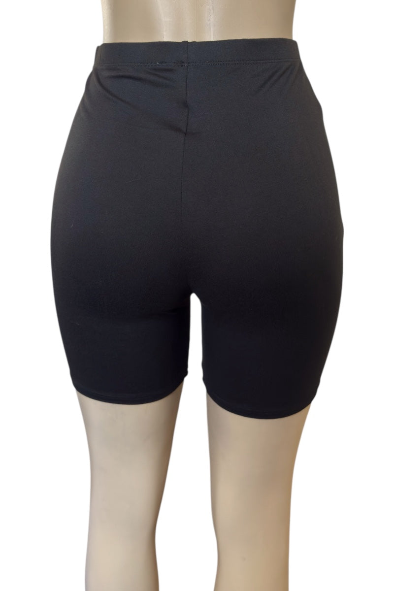 Black shorts on a mannequin with a white background