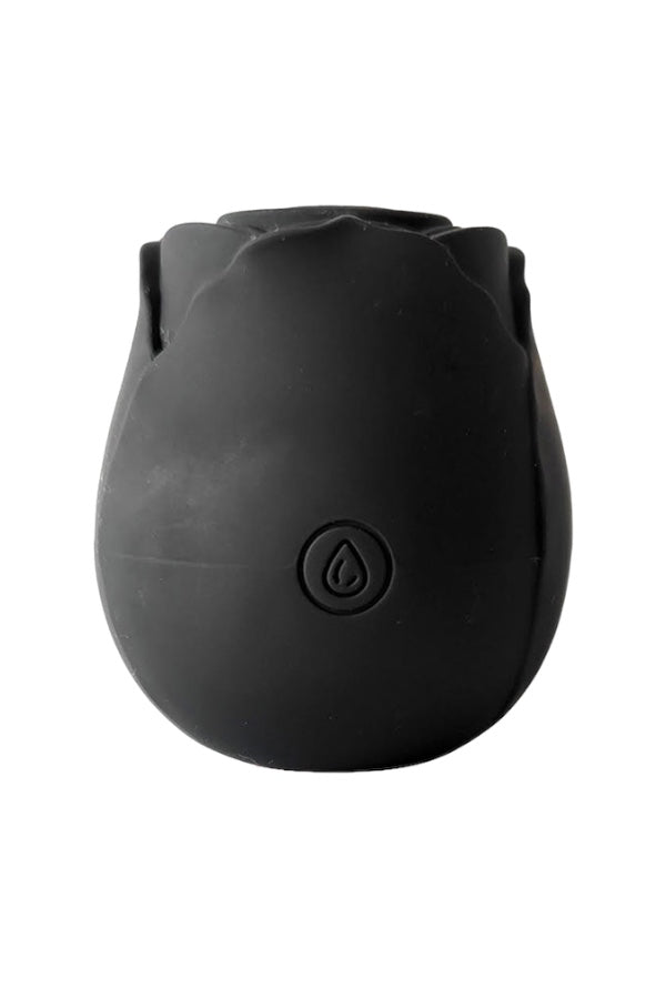 A black, rose-shaped rechargeable vibrator with a smooth surface and a button on the base.