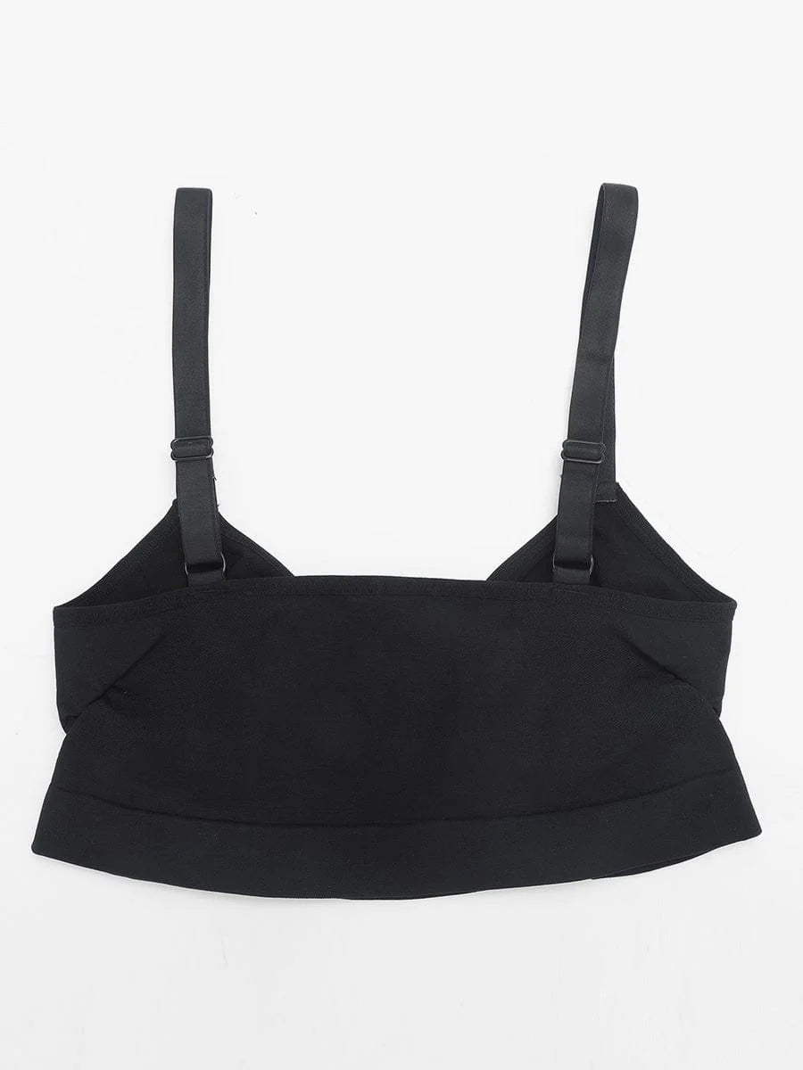 Black bralette with thin straps on a white background