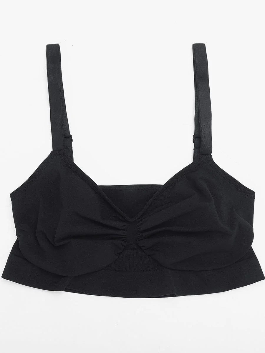 Black bralette with a bow detail on a white background
