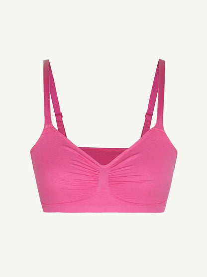 Pink fuchsia bralette on a light pink background