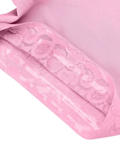 Close-up of a pink fabric with lace detailing on a white background