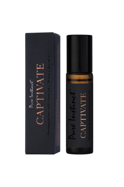 Perfume bottle and packaging of 'Pure Instinct Captivate' on a white background