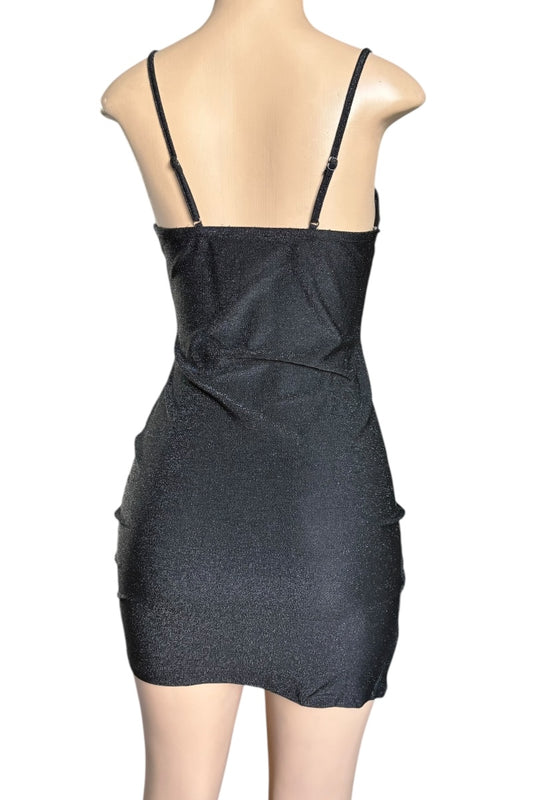 Black dress on a mannequin with a white background