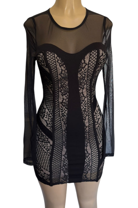 Black lace dress with sheer sleeves on a mannequin against a white background