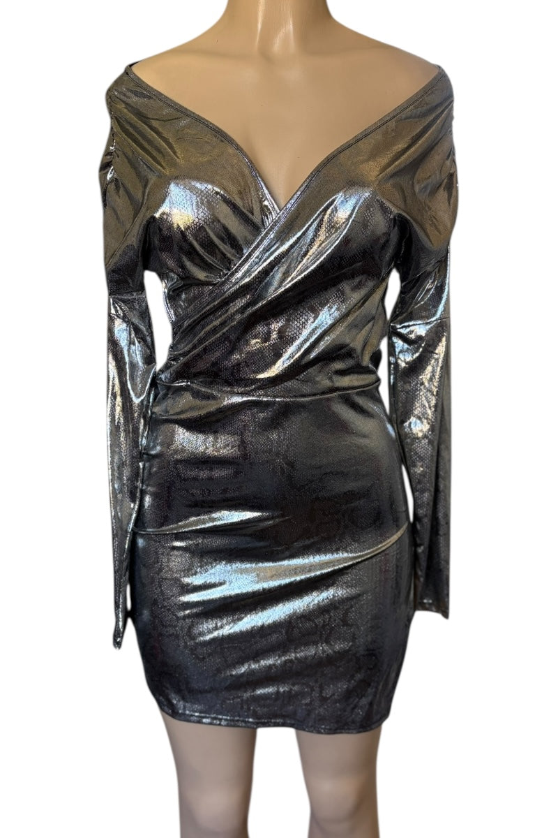 Silver metallic dress on a mannequin against a white background