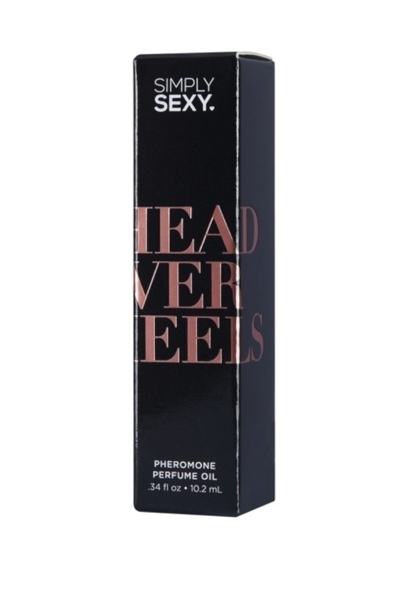 Box of 'Simply Sexy Head Over Heels' perfume oil on a white background