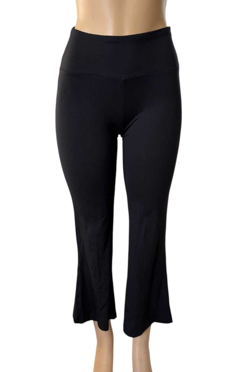 Black pants on a mannequin against a white background