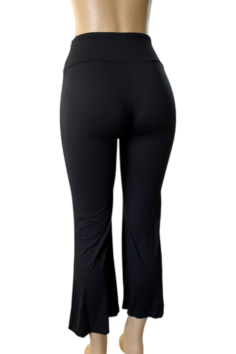 Black leggings on a mannequin against a white background