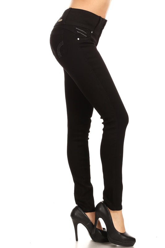 Black pants worn by a person on a white background