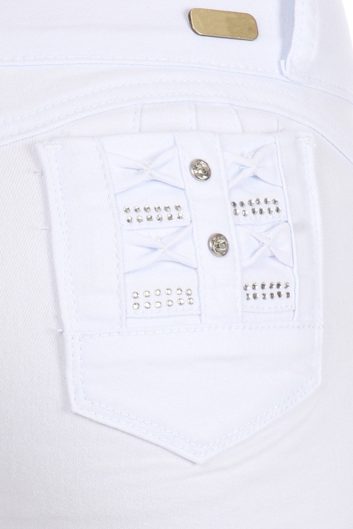 White pocket with decorative buttons and embellishments on a white background