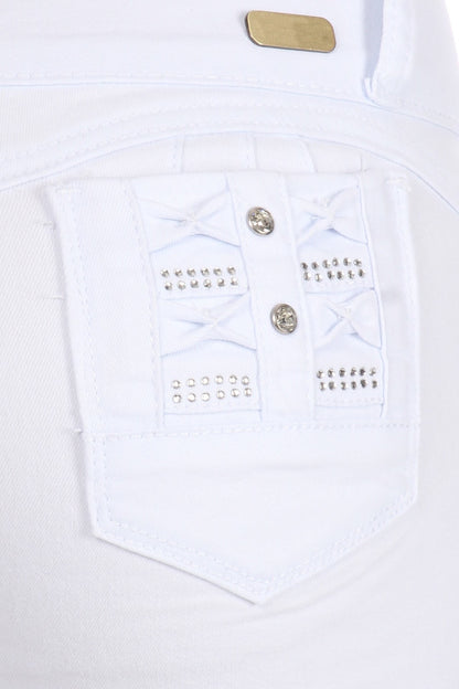 White pocket with decorative buttons and embellishments on a white background