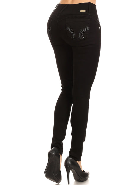 Black jeans with decorative elements on a white background