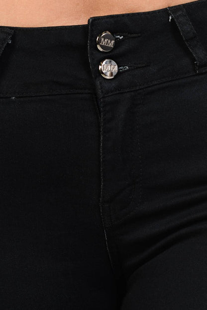 Close-up of black pants with buttons 