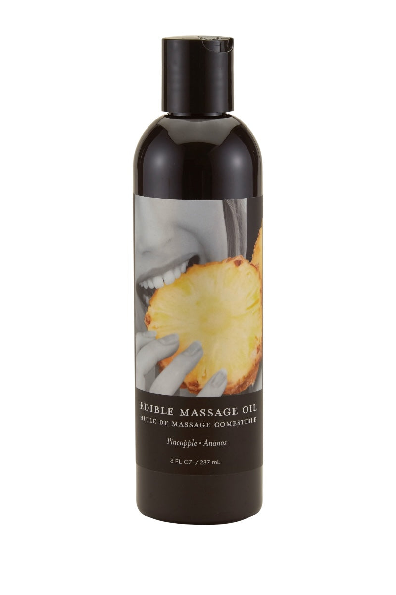 Edible massage oil bottle with pineapple design on a white background
