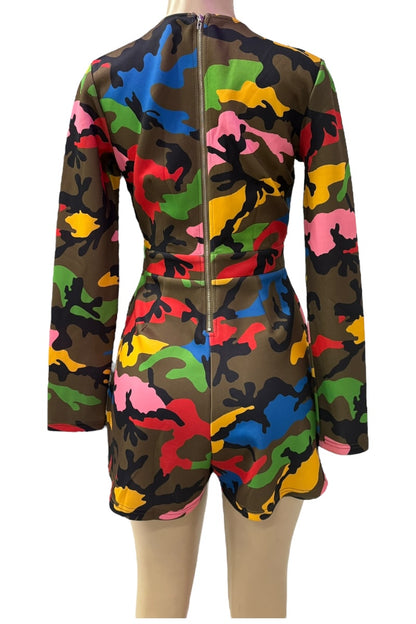Colorful camouflage-patterned romper on a mannequin against a white background