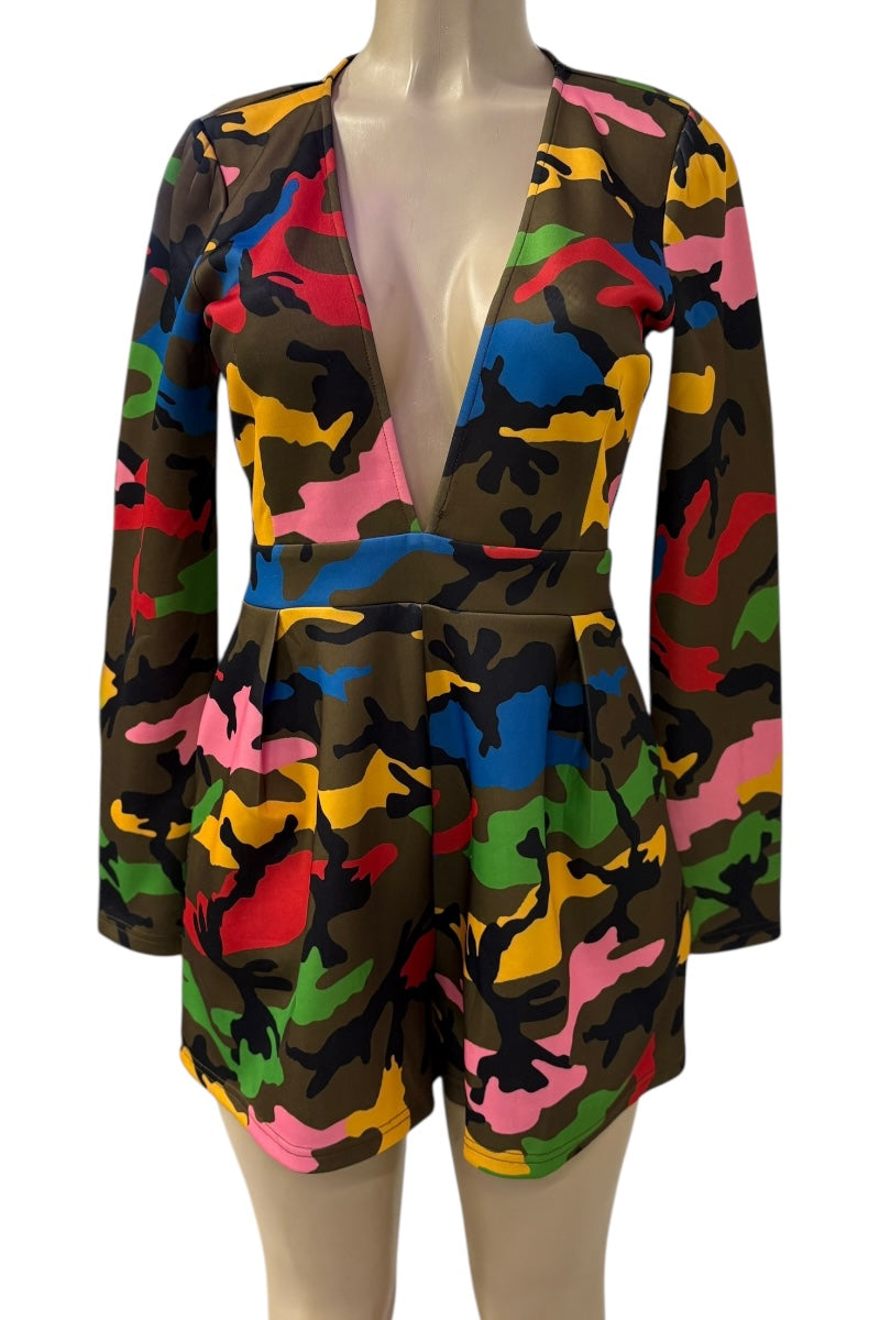 Colorful patterned romper on a mannequin against a white background