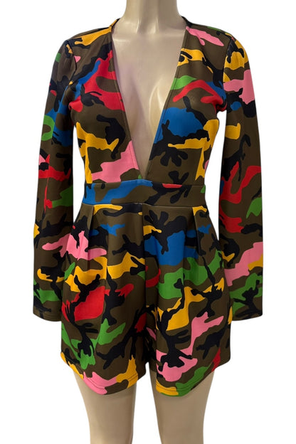 Colorful patterned romper on a mannequin against a white background