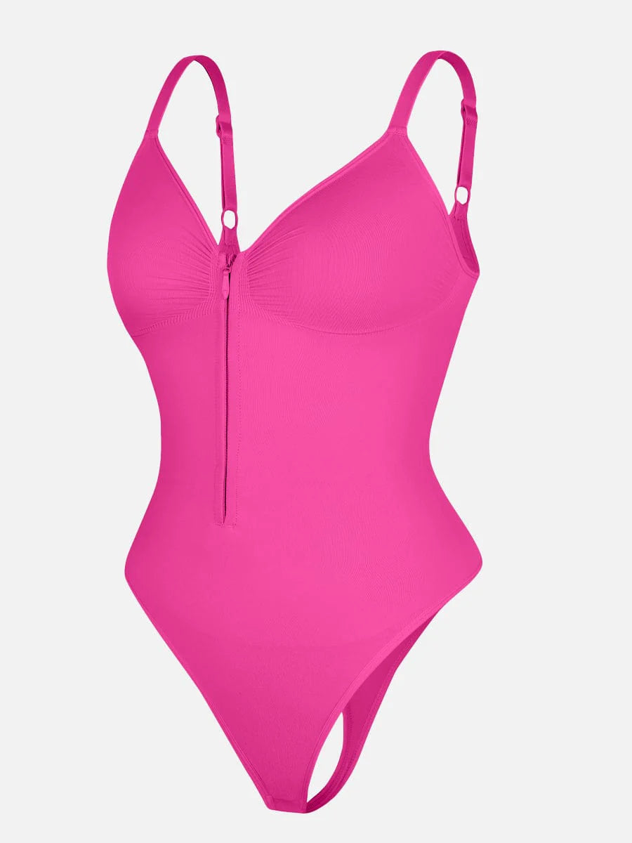 Pink one-piece bodysuit on a light gray background