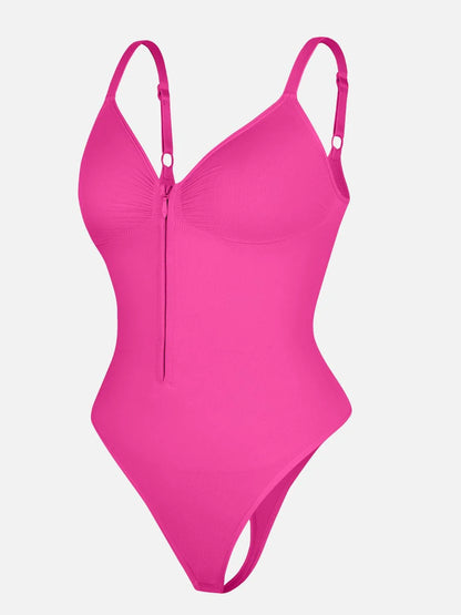 Pink one-piece bodysuit on a light gray background