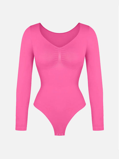 Pink bodysuit with long sleeves on a light gray background