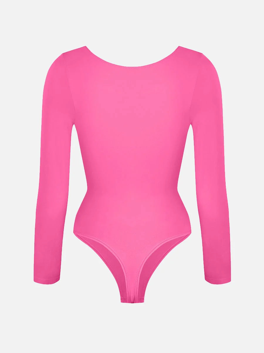 Pink bodysuit with long sleeves on a light gray background