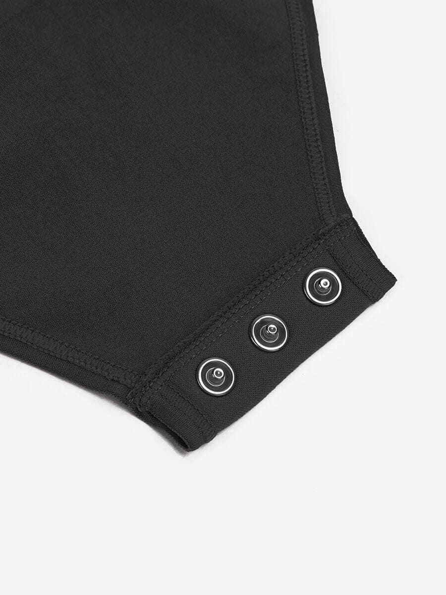 Close-up of a black bodysuit with buttons on a white background