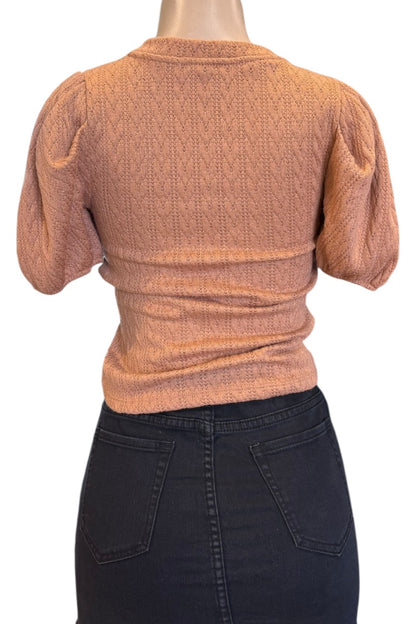 tan textured top on a mannequin with a white background