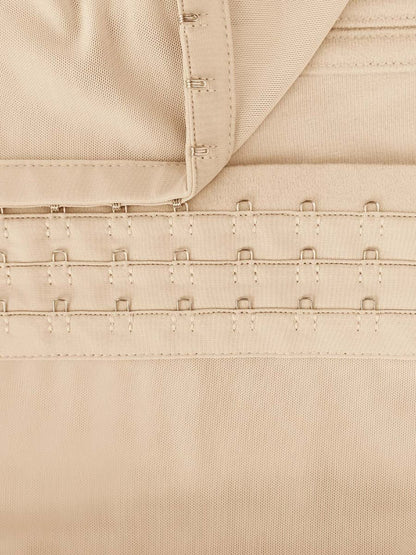 Close-up of beige fabric with stitching details