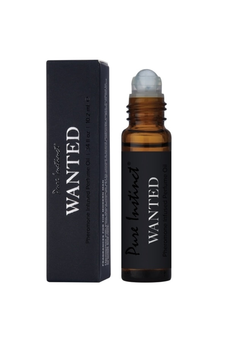 Amber rollerball bottle with black label and packaging on a white background