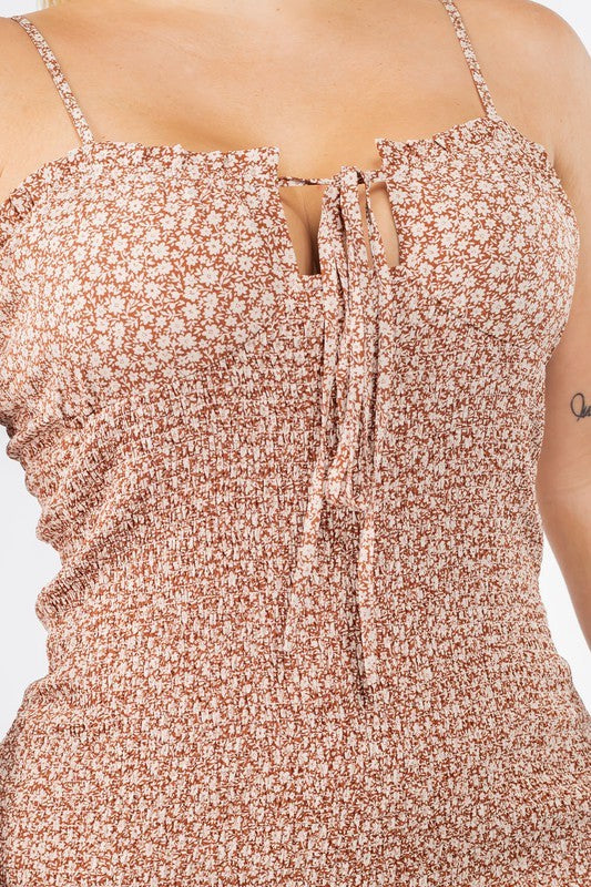 close up of Floral Smocked Cami Bodycon Dress in brown color