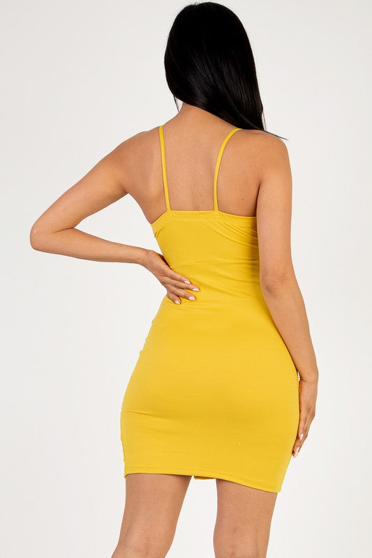 back of Solid Knit Cami Ladder Cut out Mini Dress in mustard Color