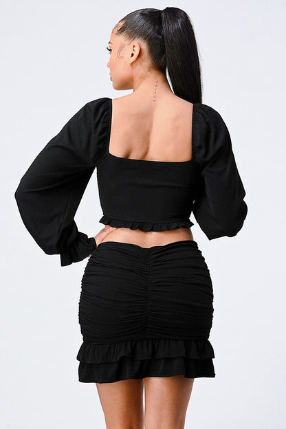 Back of Smocked Ruffled Sweater Set in Black Color
