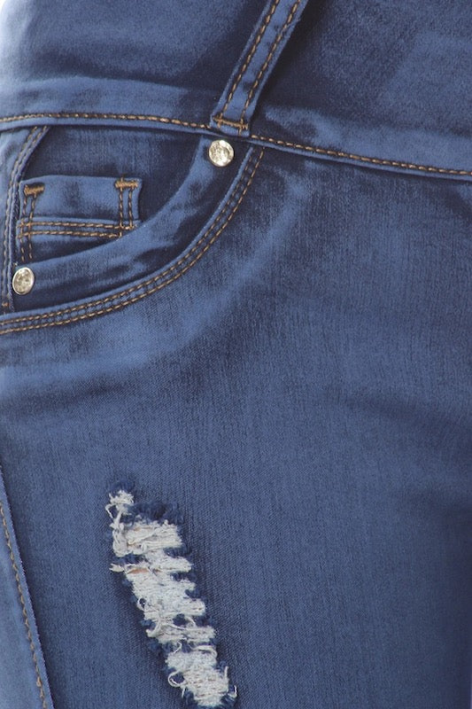 Close up of Ripped Jeans W/ Back Pocket Rhinestones in Blue