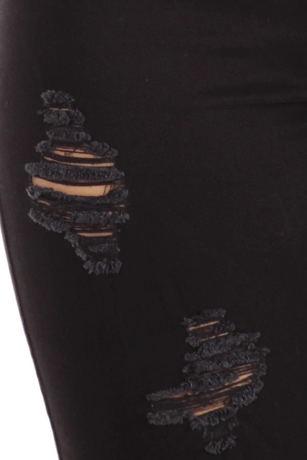 Close up of Distressed Jeans W/ Woven Pockets in Black 