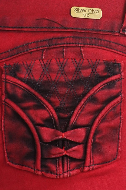 Close up of Tuxedo Studded Distressed Jeans in Red