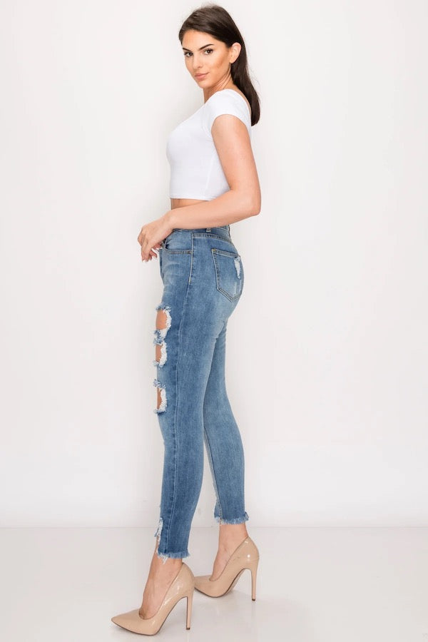 Side of Big Hole Cut Out Relaxed Jeans in Blue 