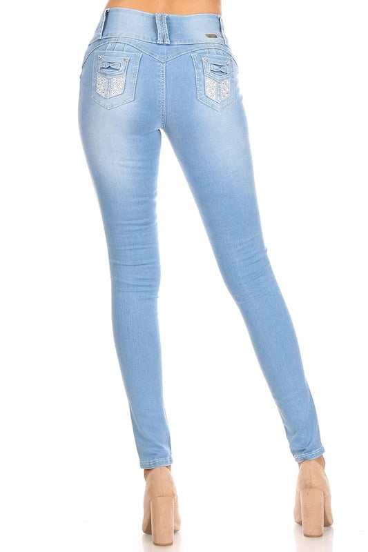 Back of Celeste Distressed High Rise Jeans With Detailed Pockets in Light Blue