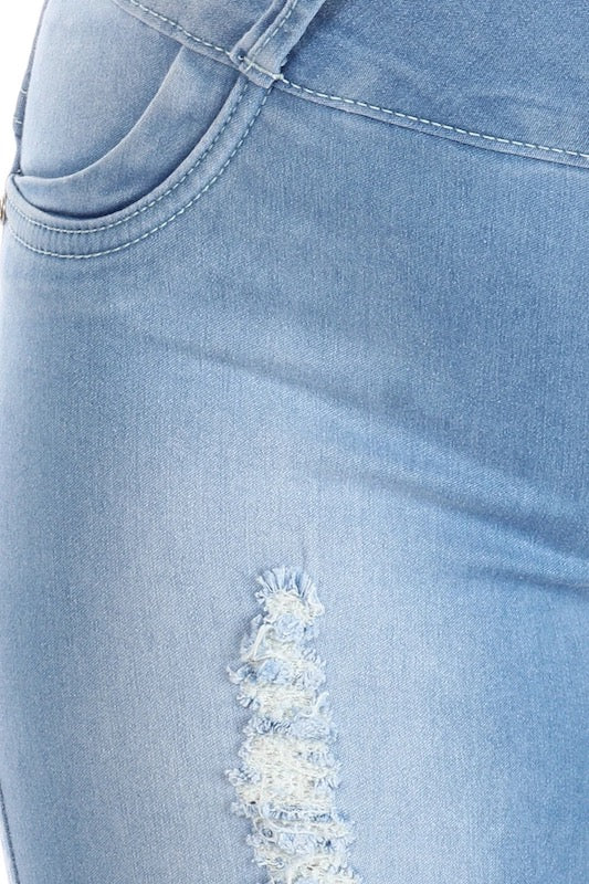 Close up of Celeste Distressed High Rise Jeans With Detailed Pockets in Light Blue