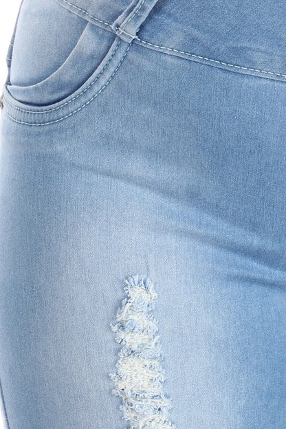Close up of Celeste Distressed High Rise Jeans With Detailed Pockets in Light Blue