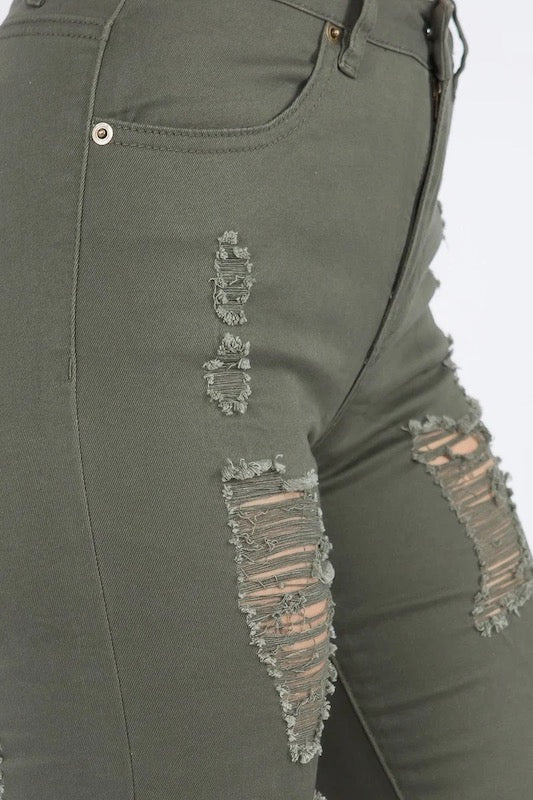 Close up of Destroyed All Over Jeans in Olive Color