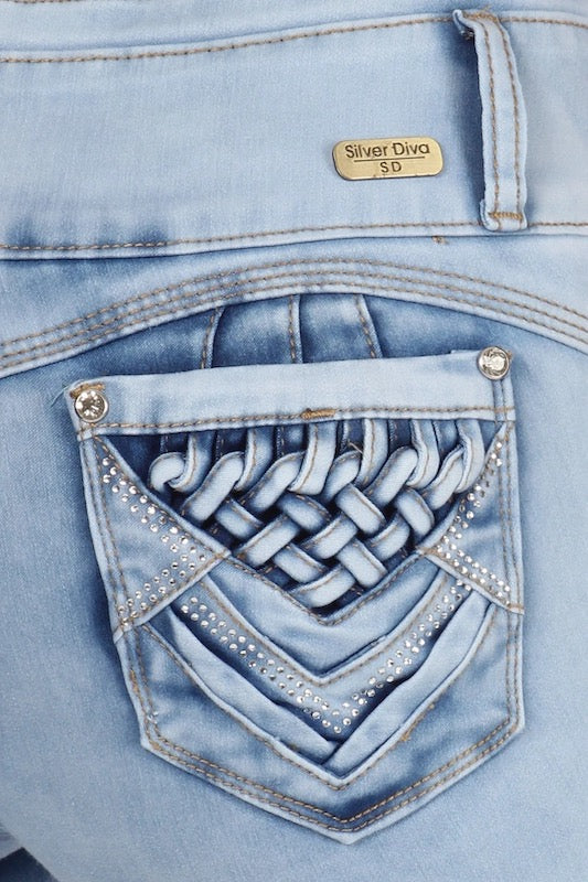 Close up of Amy Distressed High Waist Jeans W/ Woven Pockets in Light Blue
